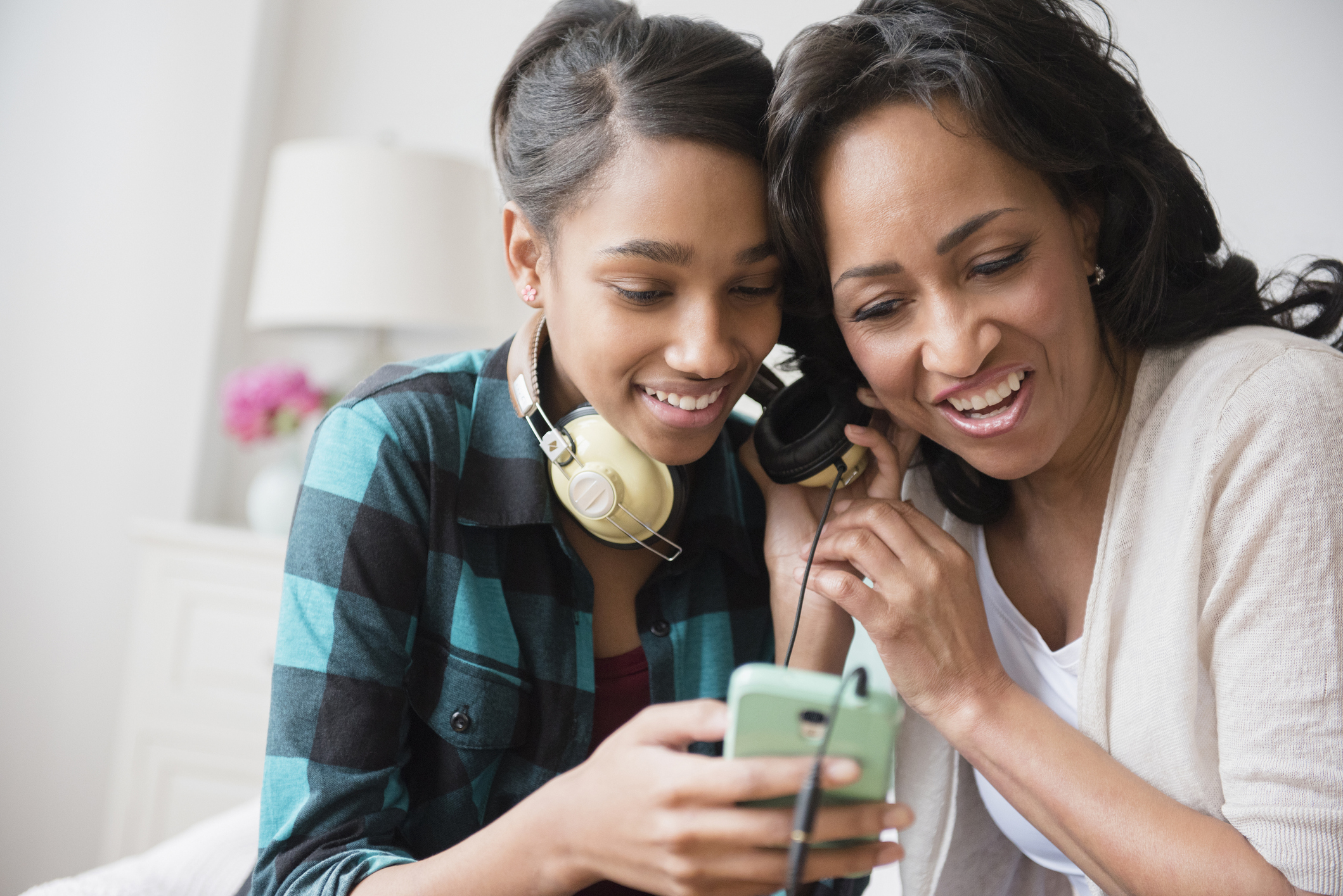 child and mother laughing 