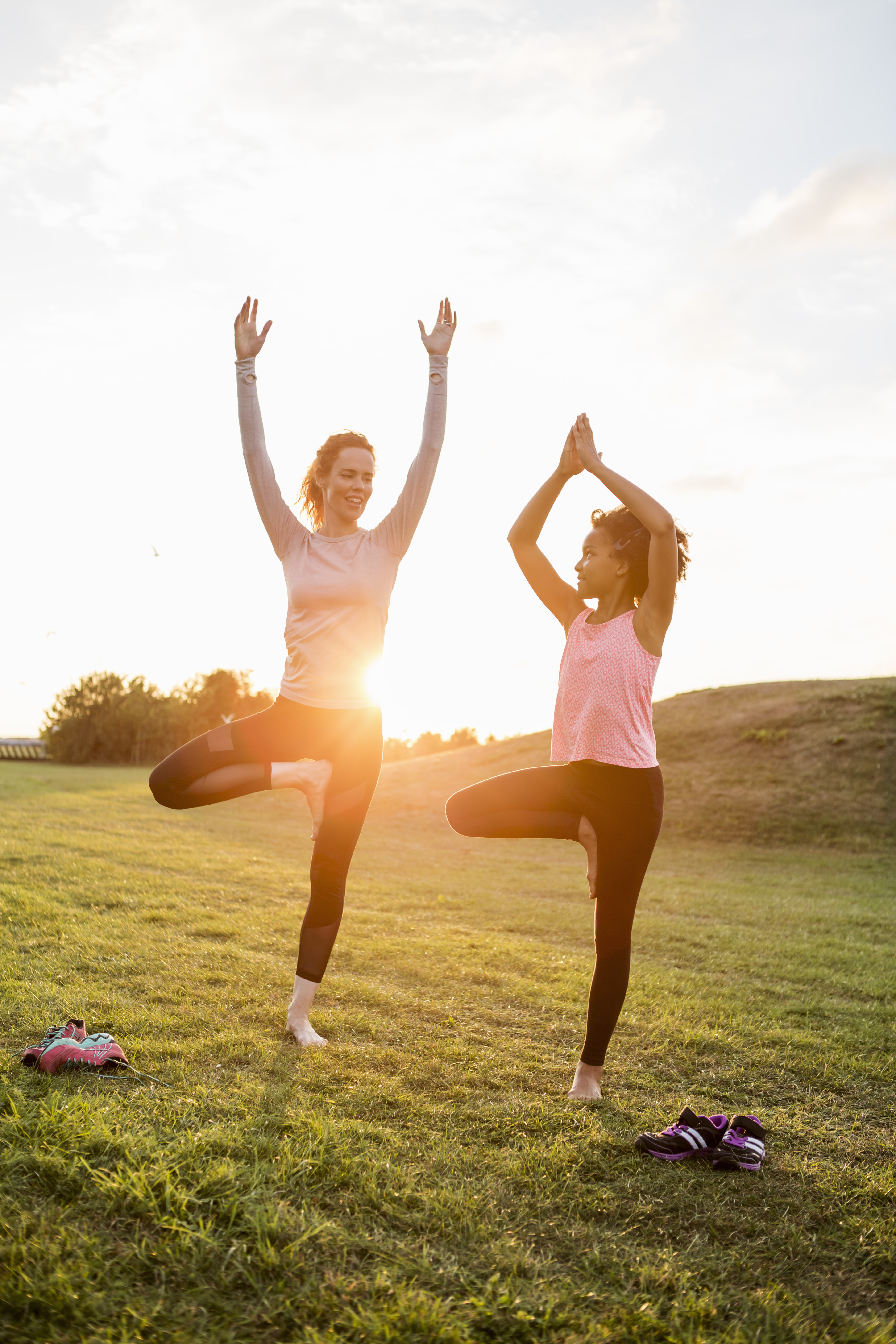 Happy family doing yoga