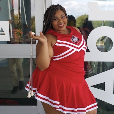 child cancer patient in drill team uniform